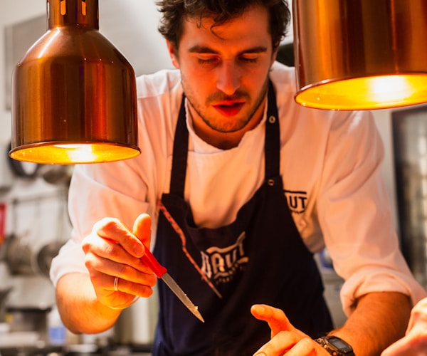 Chef preparing dish